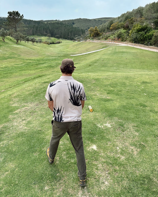 Golfer in Volpe polo stepping up to the tee on a Portuguese golf course