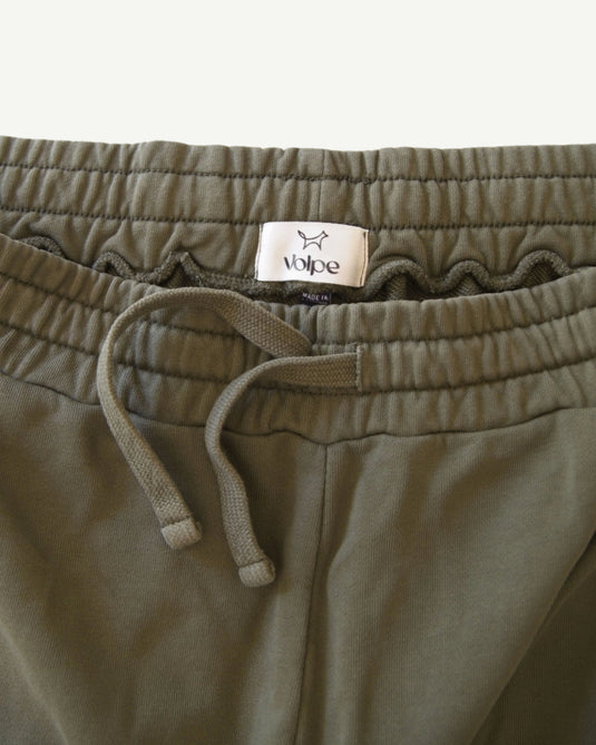 Close up of inside label of a pair of Volpe sweat shorts