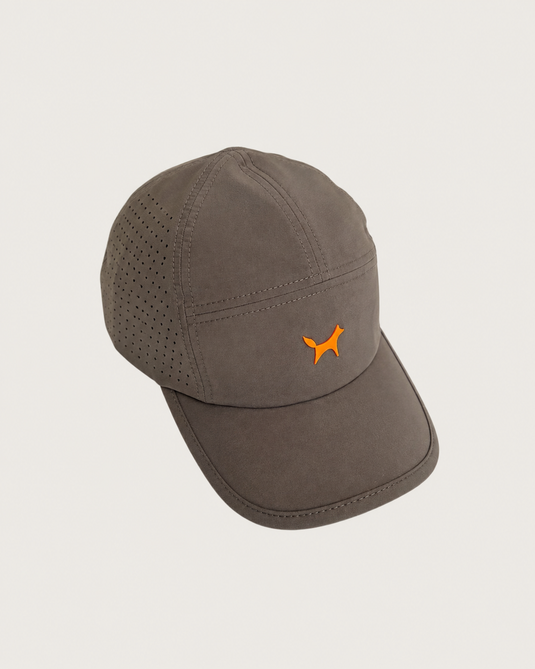 Grey cap with an orange logo on a light gray background