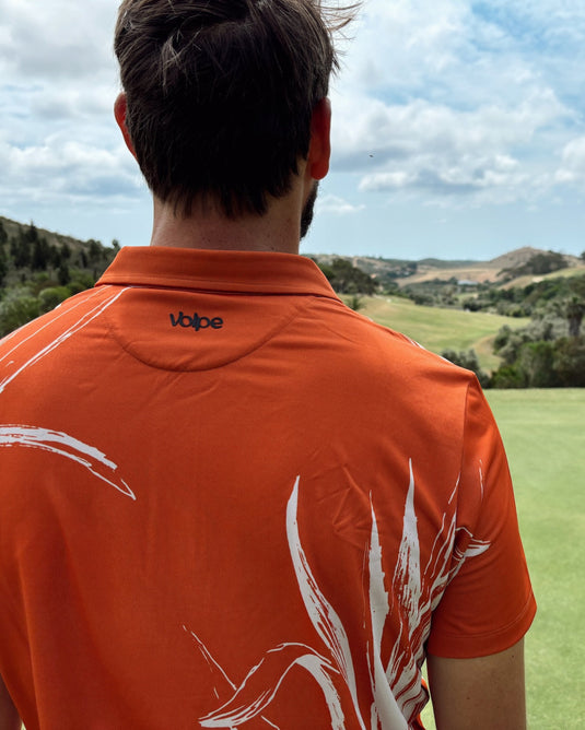 Photo that shows the logo on the back of the polo